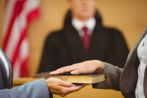 Witness-swearing-on-bible