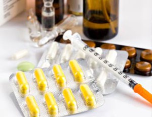 pills and syringe