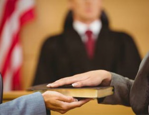 hand on bible courtroom