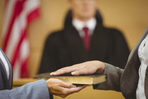 Witness-swearing-on-bible